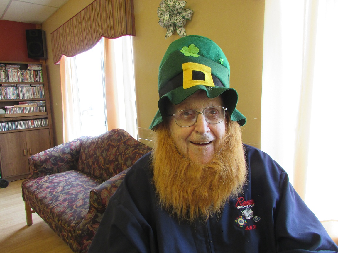 Jim B wearing red beard and green hat for st. patrick's day