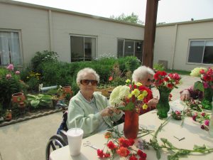 Lodgers Eleanor doing some flower arranging out on the courtyard. (1)